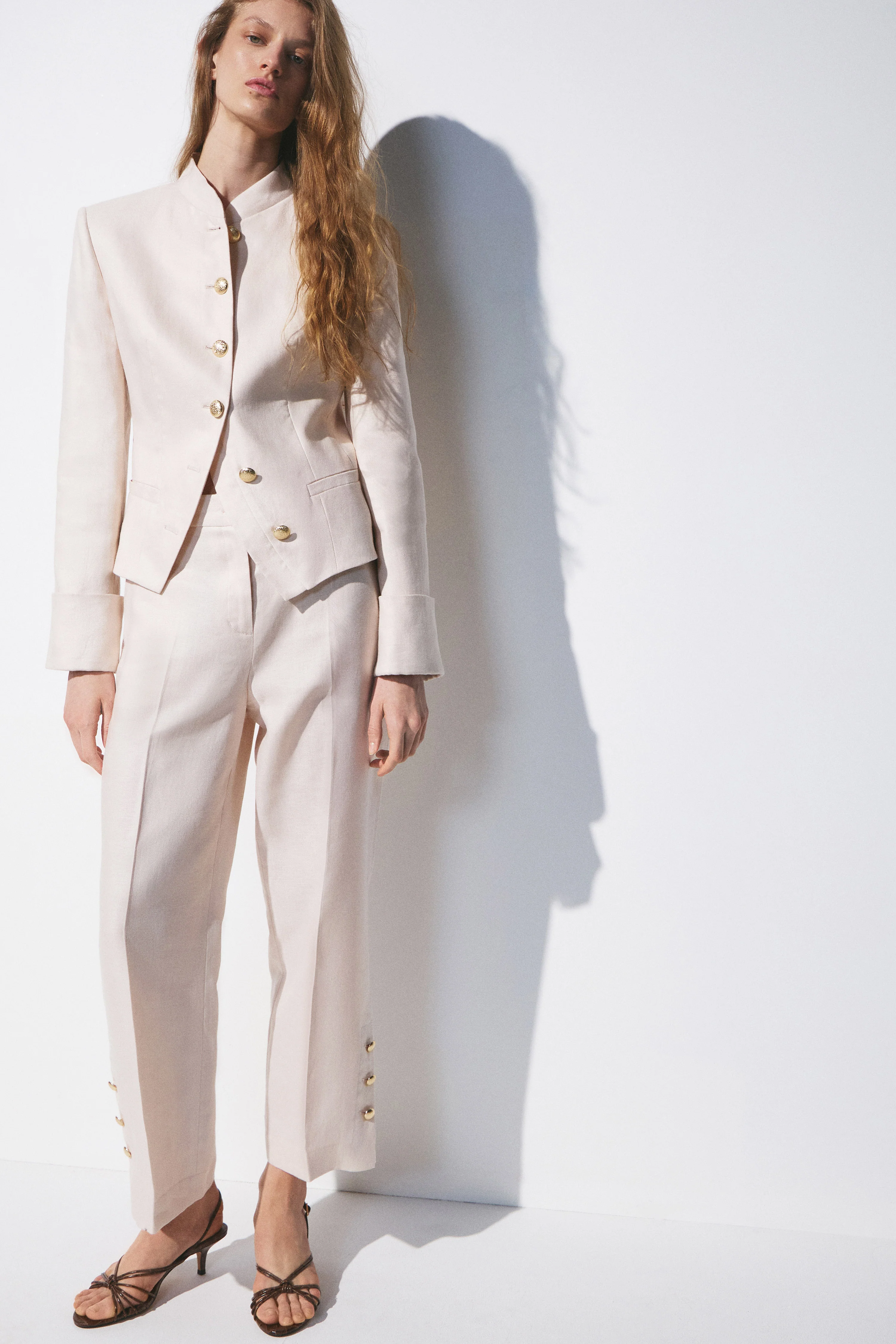 CREASED LINEN TROUSERS