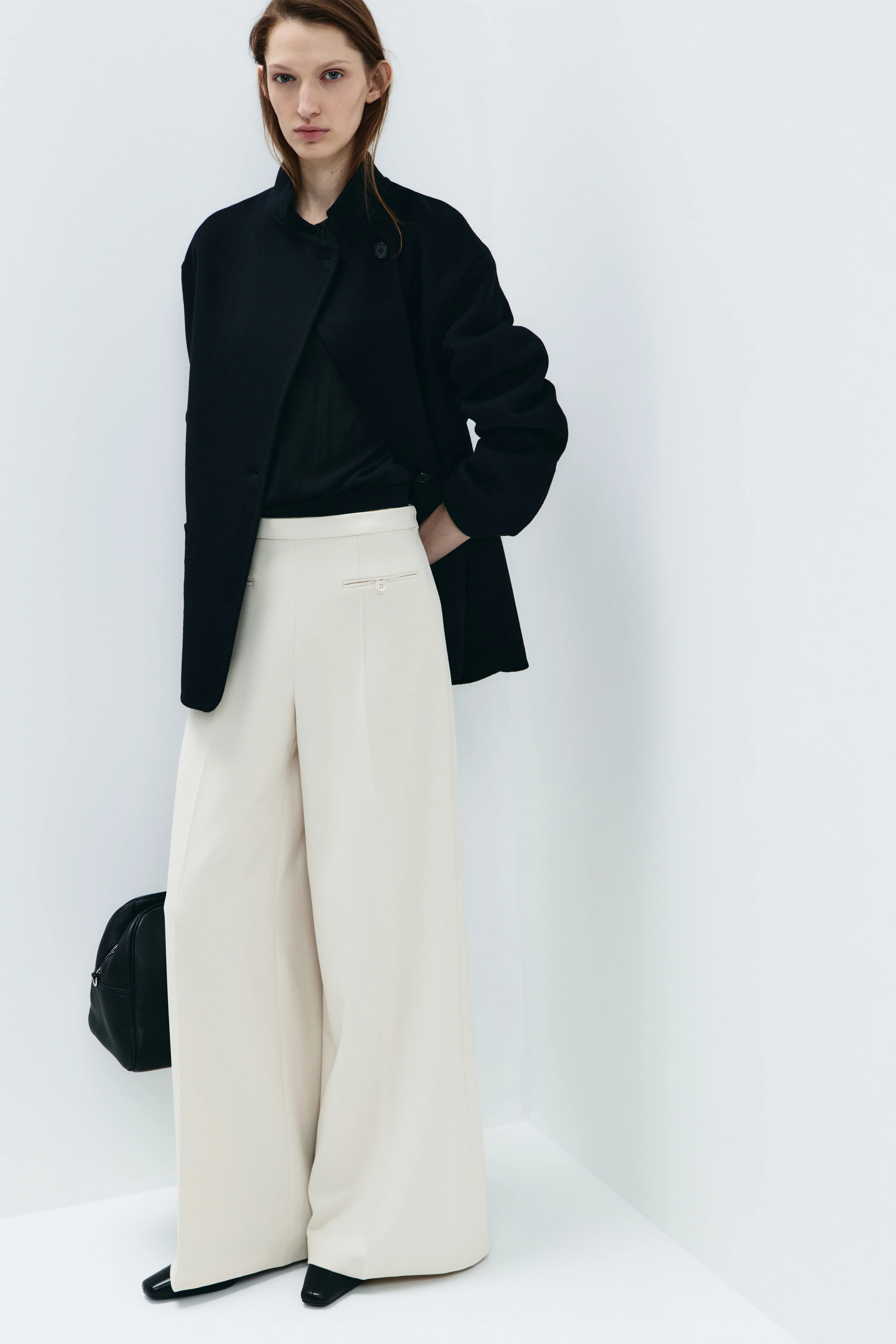 CREASED WIDE TROUSERS