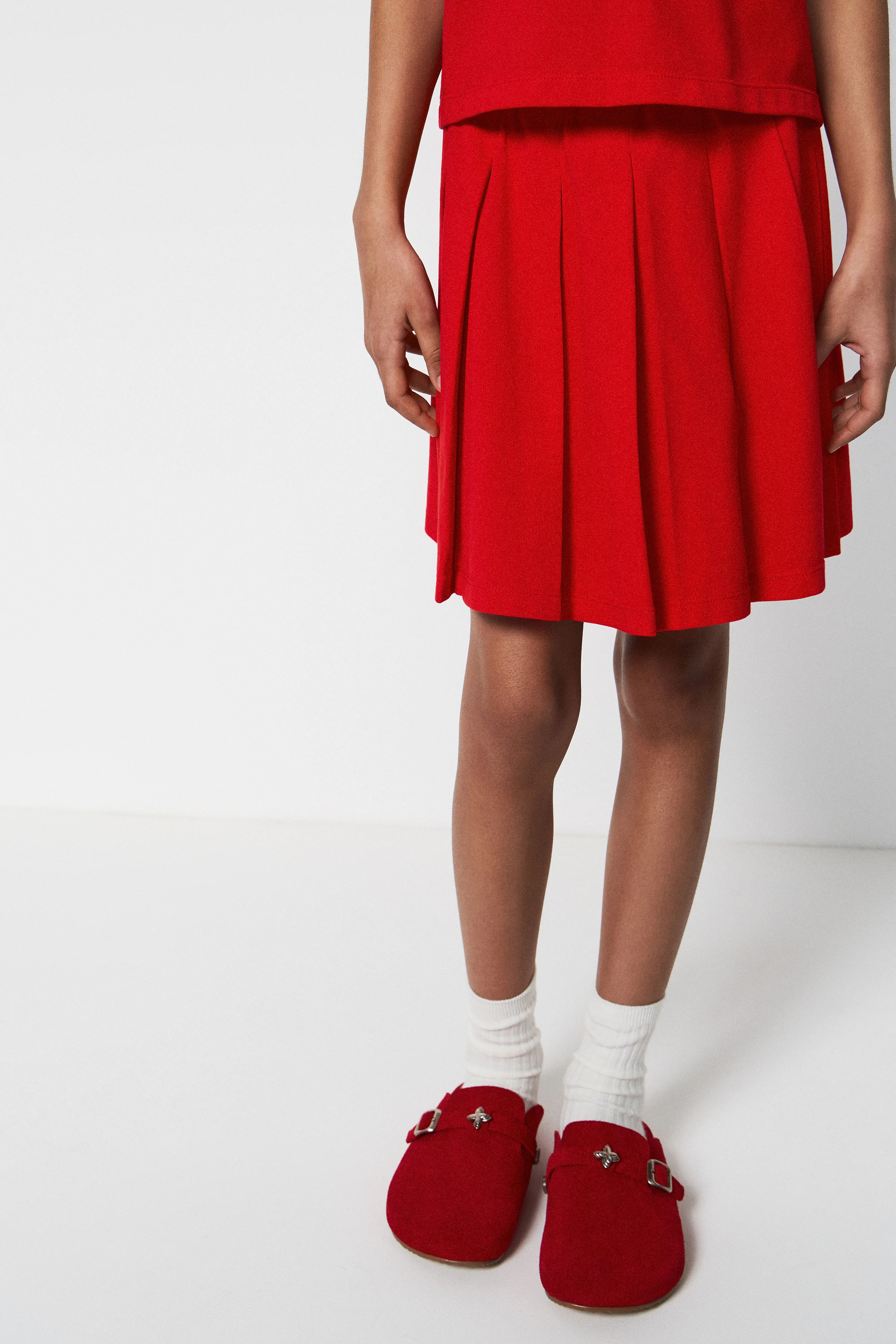 PLEATED COTTON PIQUÉ SKIRT