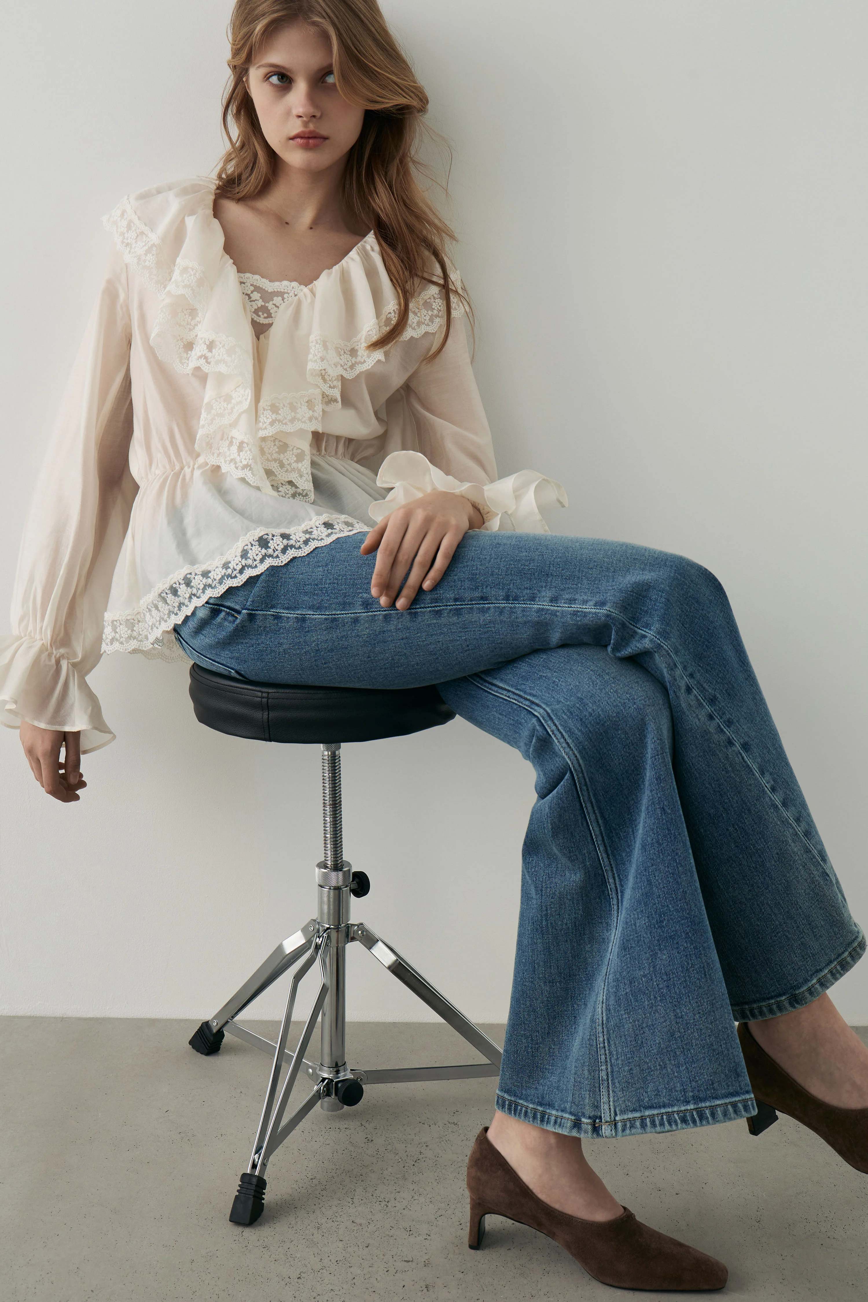 RUFFLED LYOCELL-BLEND BLOUSE