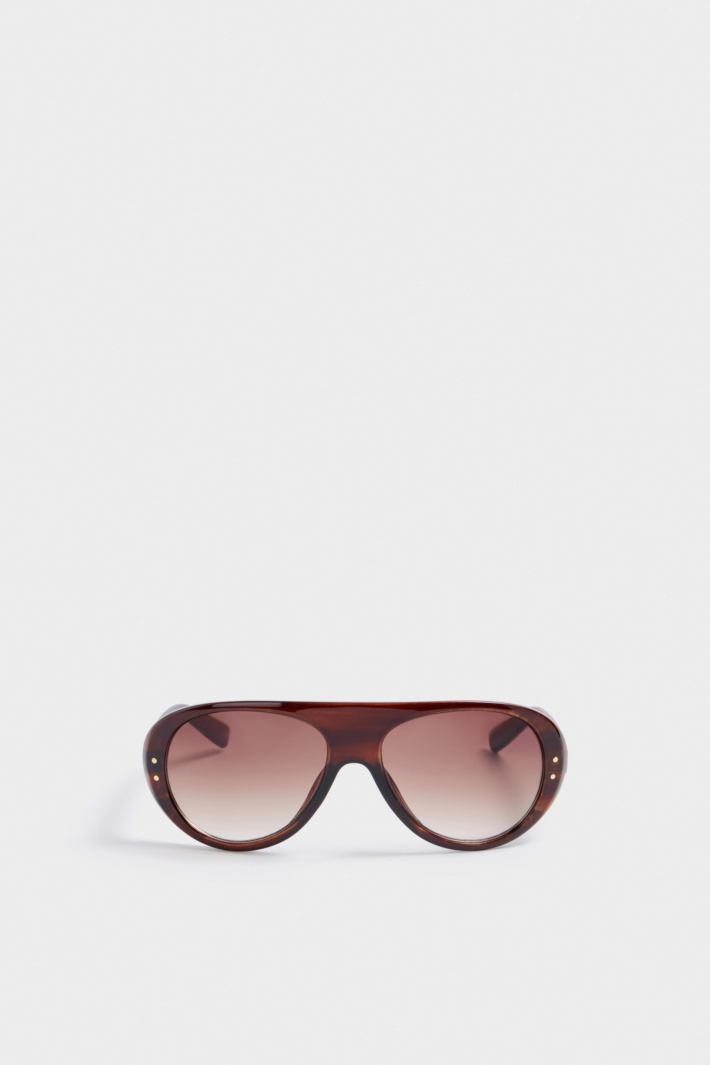 SUNGLASSES WITH UV-PROTECTIVE LENSES